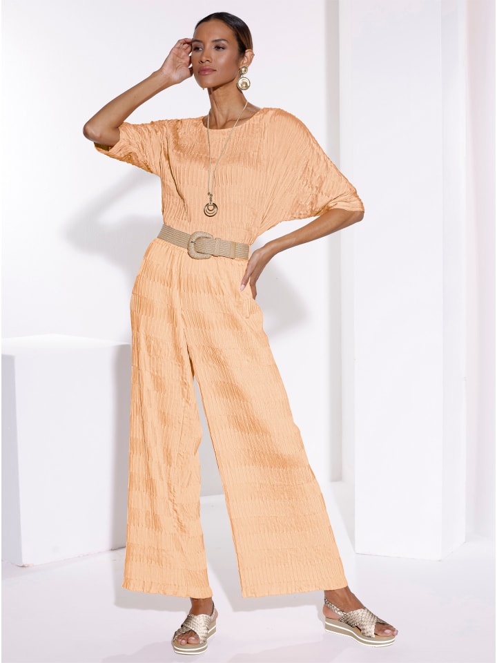 Creation L Брюки абрикосового цвета на резинке
Creation L Брюки абрикосового цвета на резинке