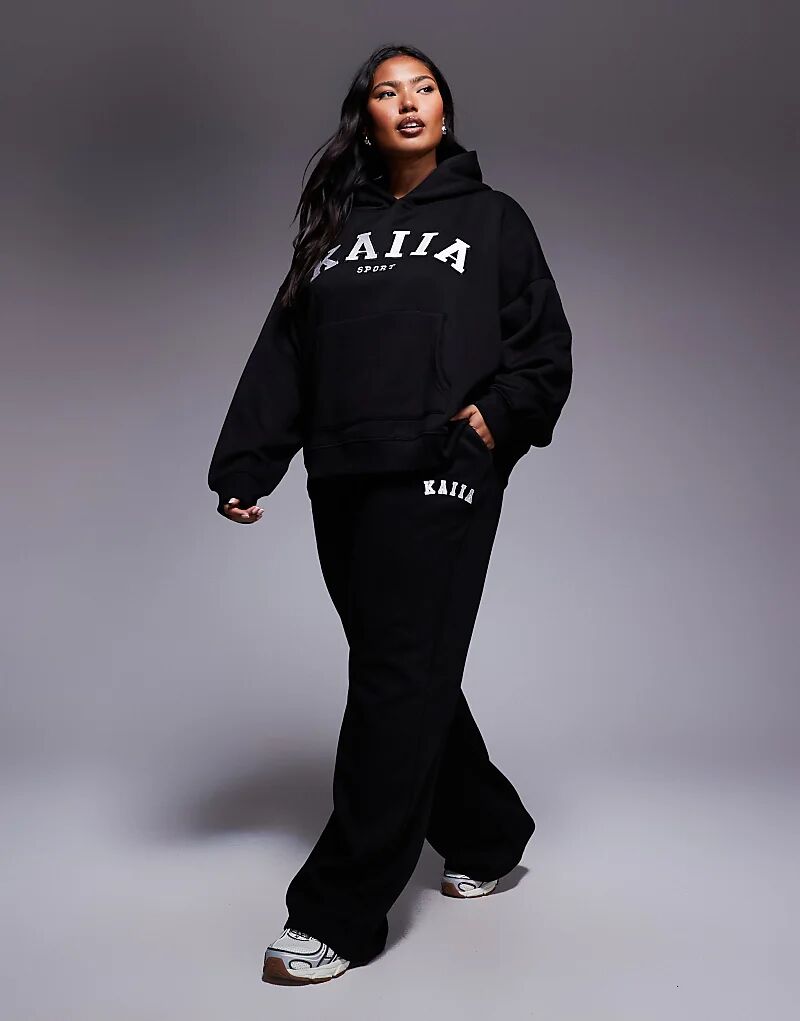 Черные широкие джоггеры Kaiia Plus
Черные широкие джоггеры Kaiia Plus