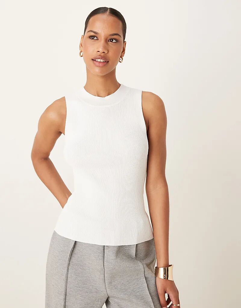 Белый трикотажный топ без рукавов Mango с высоким воротом
Белый трикотажный топ без рукавов Mango с высоким воротом