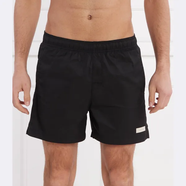 Купальные шорты стандартного кроя Calvin Klein, черный
Купальные шорты стандартного кроя Calvin Klein, черный