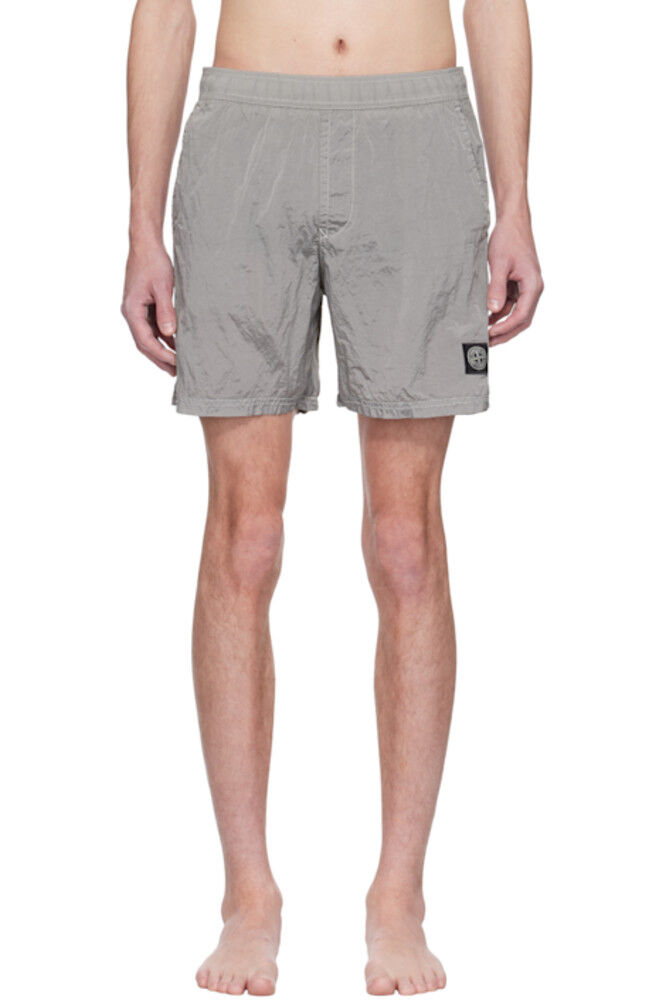 Шорты для плавания ECONYL из серого нейлона и металла Stone Island
Шорты для плавания ECONYL из серого нейлона и металла Stone Island