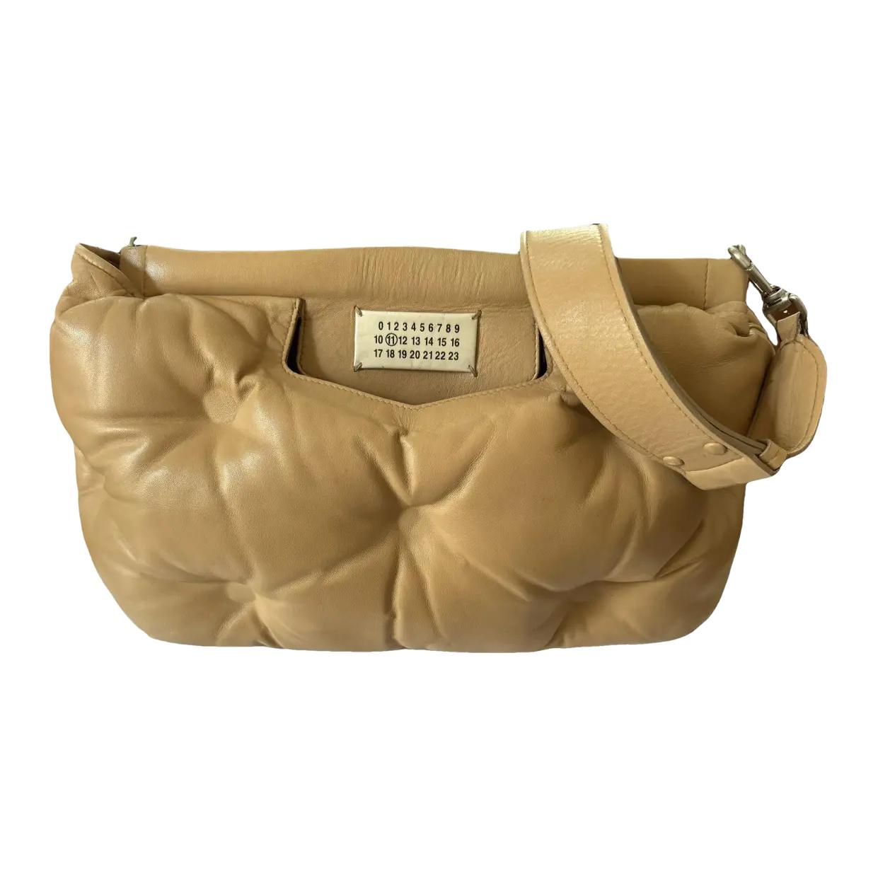 Maison Margiela Женская кожаная сумка кроссбоди через плечо имбирно-желтая
Maison Margiela Женская кожаная сумка кроссбоди через плечо имбирно-желтая