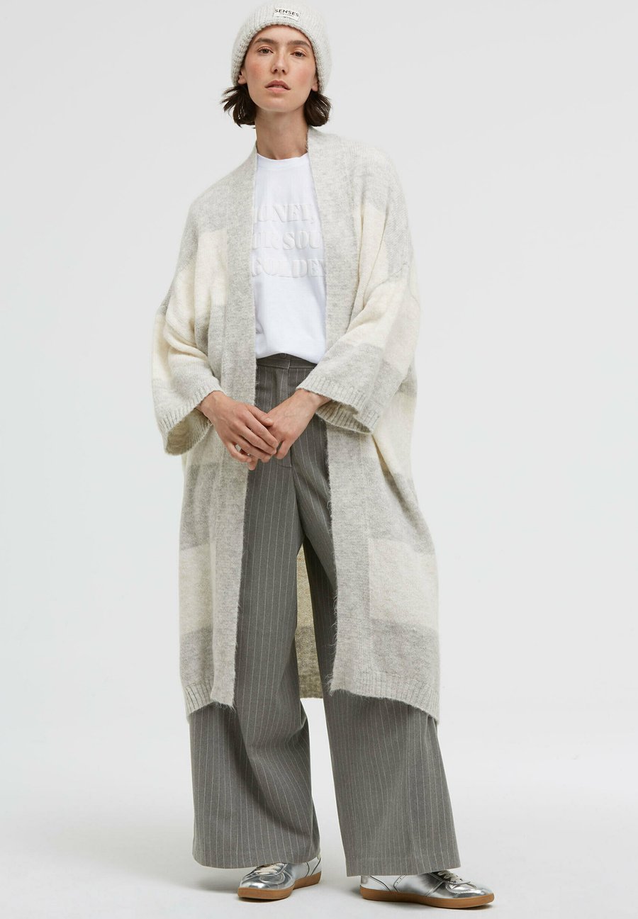 Кардиган SENSES.THE LABEL Cardigan, Cozy Grey Melange Ivory/Grey
Кардиган SENSES.THE LABEL Cardigan, Cozy Grey Melange Ivory/Grey