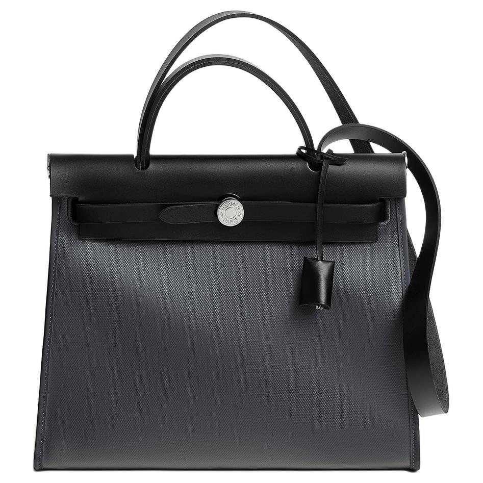 HERMES Кожаная сумка унисекс известняково-серого и светло-бежевого цвета с черными деталями
HERMES Кожаная сумка унисекс известняково-серого и светло-бежевого цвета с черными деталями