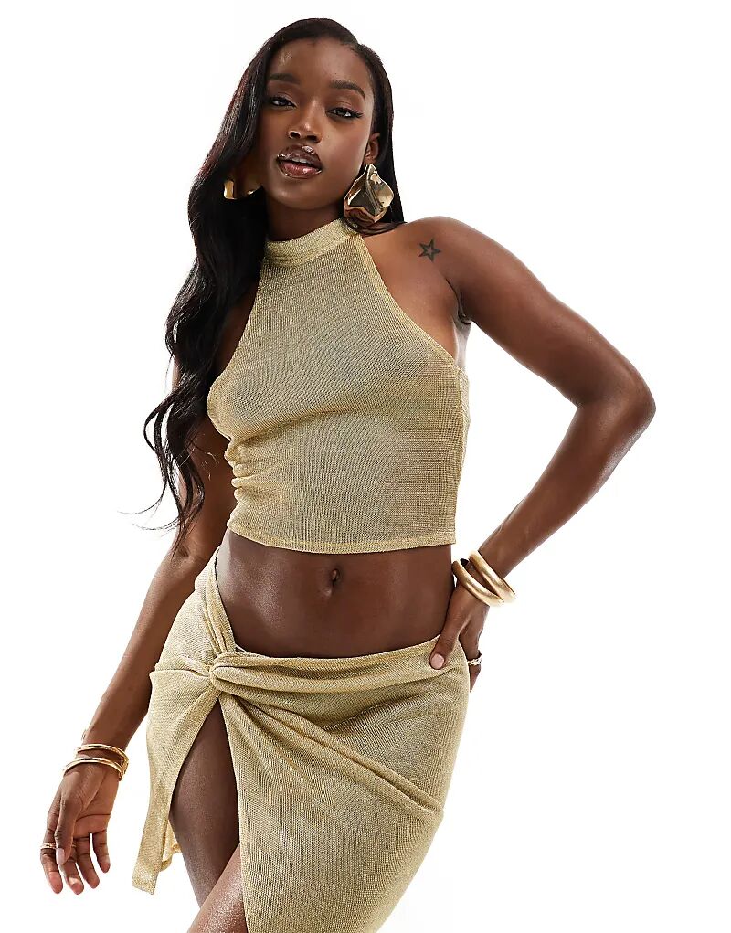 Трикотажный топ с принтом цепочек ASOS DESIGN золотистого цвета
Трикотажный топ с принтом цепочек ASOS DESIGN золотистого цвета