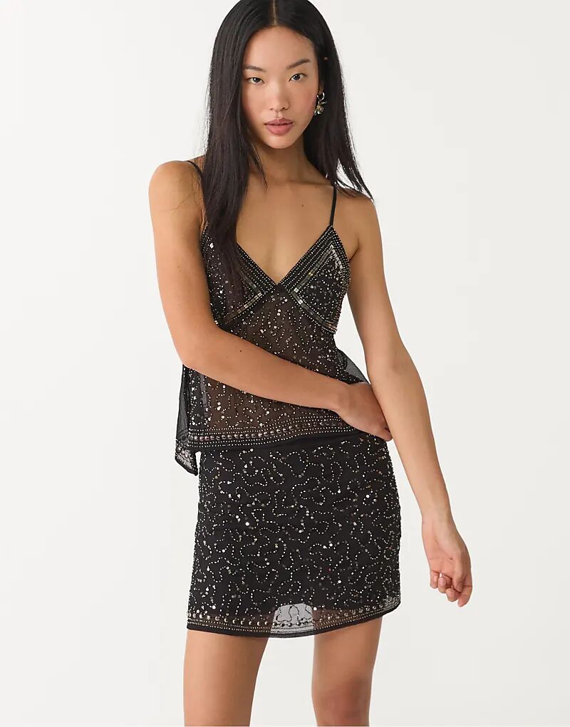 Мини-юбка-шорты Stradivarius с вышивкой черного цвета
Мини-юбка-шорты Stradivarius с вышивкой черного цвета