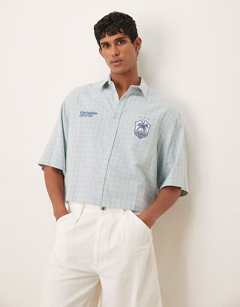 Укороченная рубашка оверсайз ASOS DESIGN в синюю клетку
Укороченная рубашка оверсайз ASOS DESIGN в синюю клетку