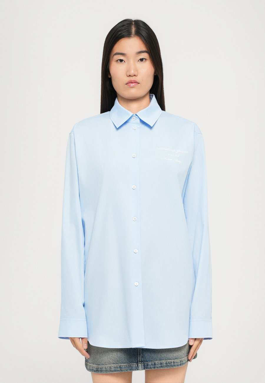 Блуза MOSCHINO JEANS Button-down blouse, Light Blue
Блуза MOSCHINO JEANS Button-down blouse, Light Blue