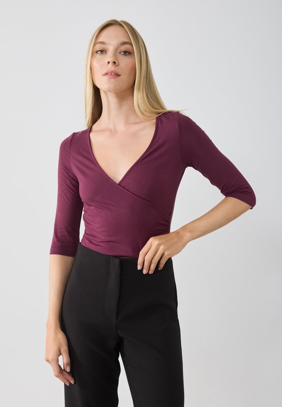 Топ Anna Field WRAP BODYSUIT, Fig/Bordeaux
Топ Anna Field WRAP BODYSUIT, Fig/Bordeaux