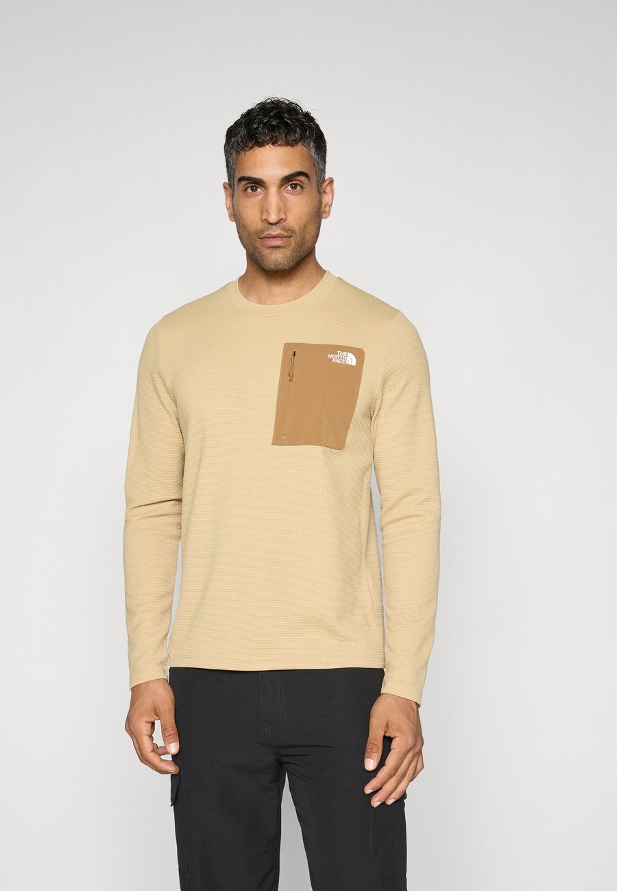 Топ The North Face KECHA CREW, Khaki Stone/Utility Brown/Light Brown
Топ The North Face KECHA CREW, Khaki Stone/Utility Brown/Light Brown