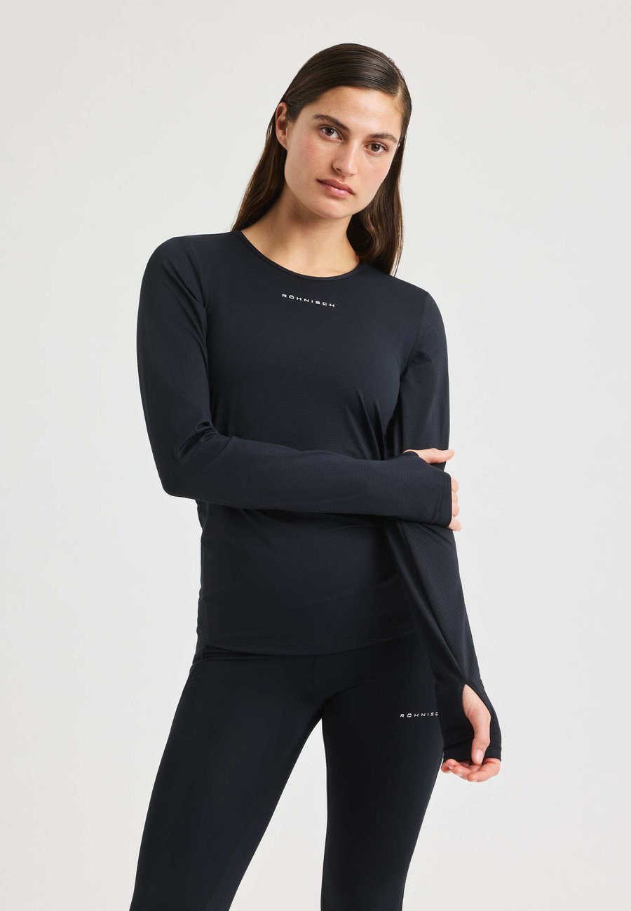 Топ Röhnisch JACQUARD LS, Huckleberry/Black
Топ Röhnisch JACQUARD LS, Huckleberry/Black