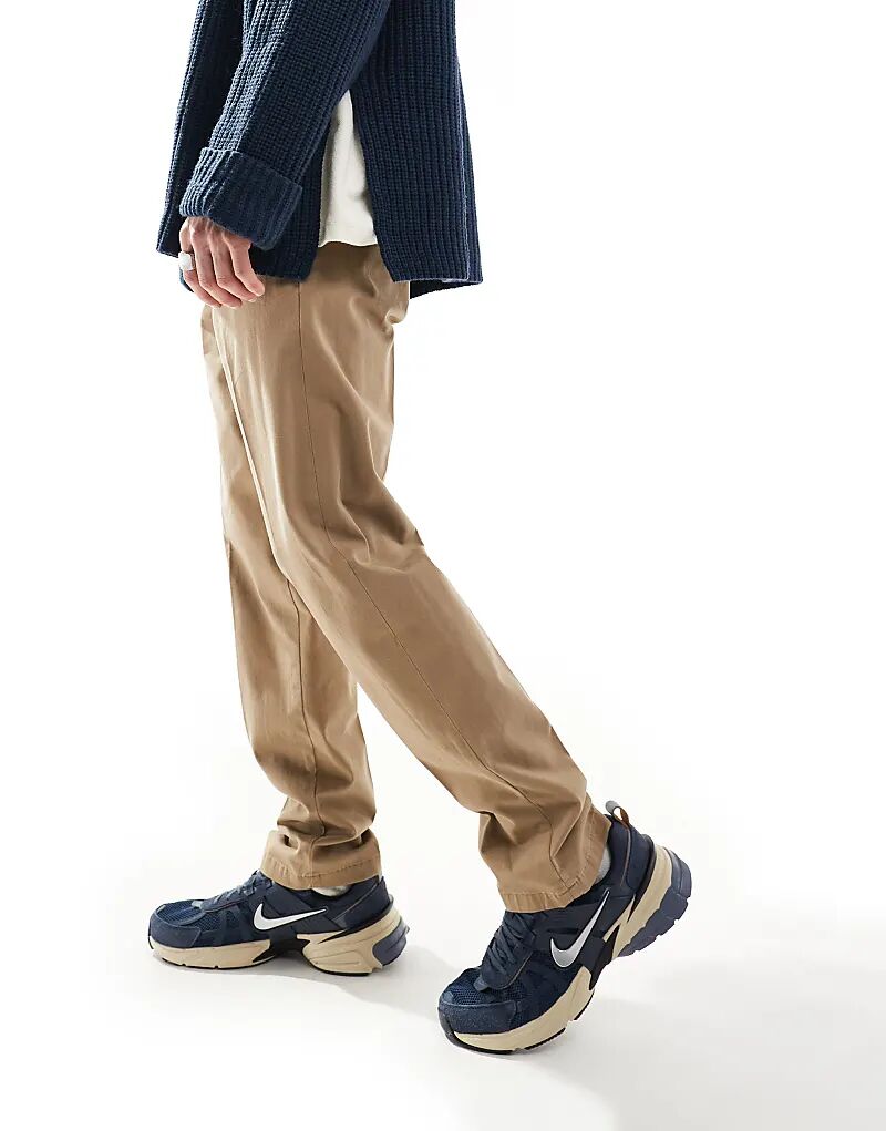 Брюки-чинос с зауженной складкой спереди бежевого цвета Jack & Jones
Брюки-чинос с зауженной складкой спереди бежевого цвета Jack & Jones