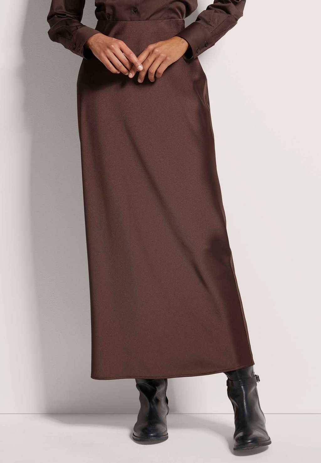 Юбка макси LANGER ZUM SCHLÜPFEN MADELEINE, коричневый
Юбка макси LANGER ZUM SCHLÜPFEN MADELEINE, коричневый
