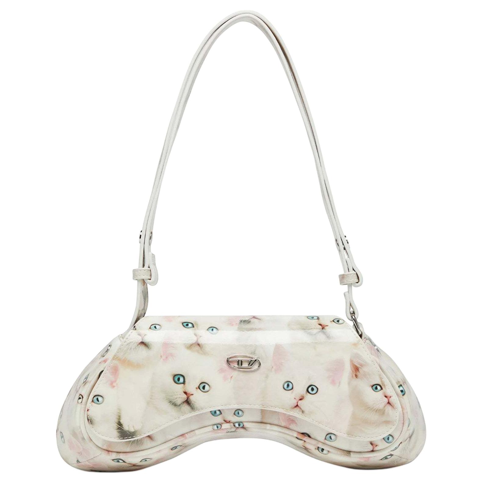 Плечевая сумка с графическим принтом DIESEL
Плечевая сумка с графическим принтом DIESEL