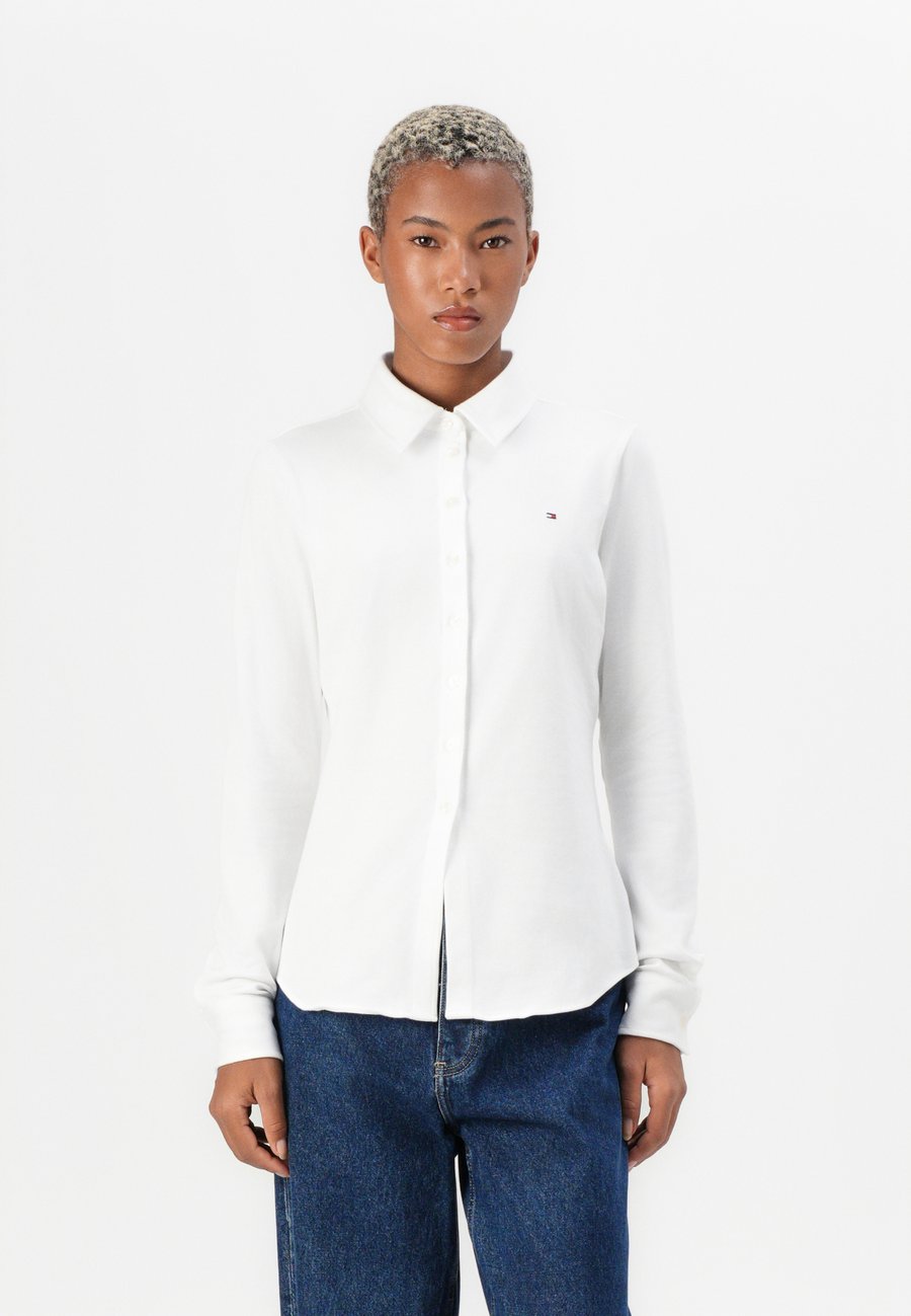 Блуза Tommy Hilfiger SLIM BUTTON DOWN, Ecru/Off-White
Блуза Tommy Hilfiger SLIM BUTTON DOWN, Ecru/Off-White