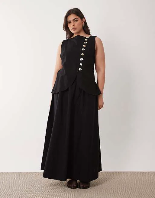 Черное платье макси с льняным жилетом и юбкой из поплина ASOS DESIGN Curve
Черное платье макси с льняным жилетом и юбкой из поплина ASOS DESIGN Curve