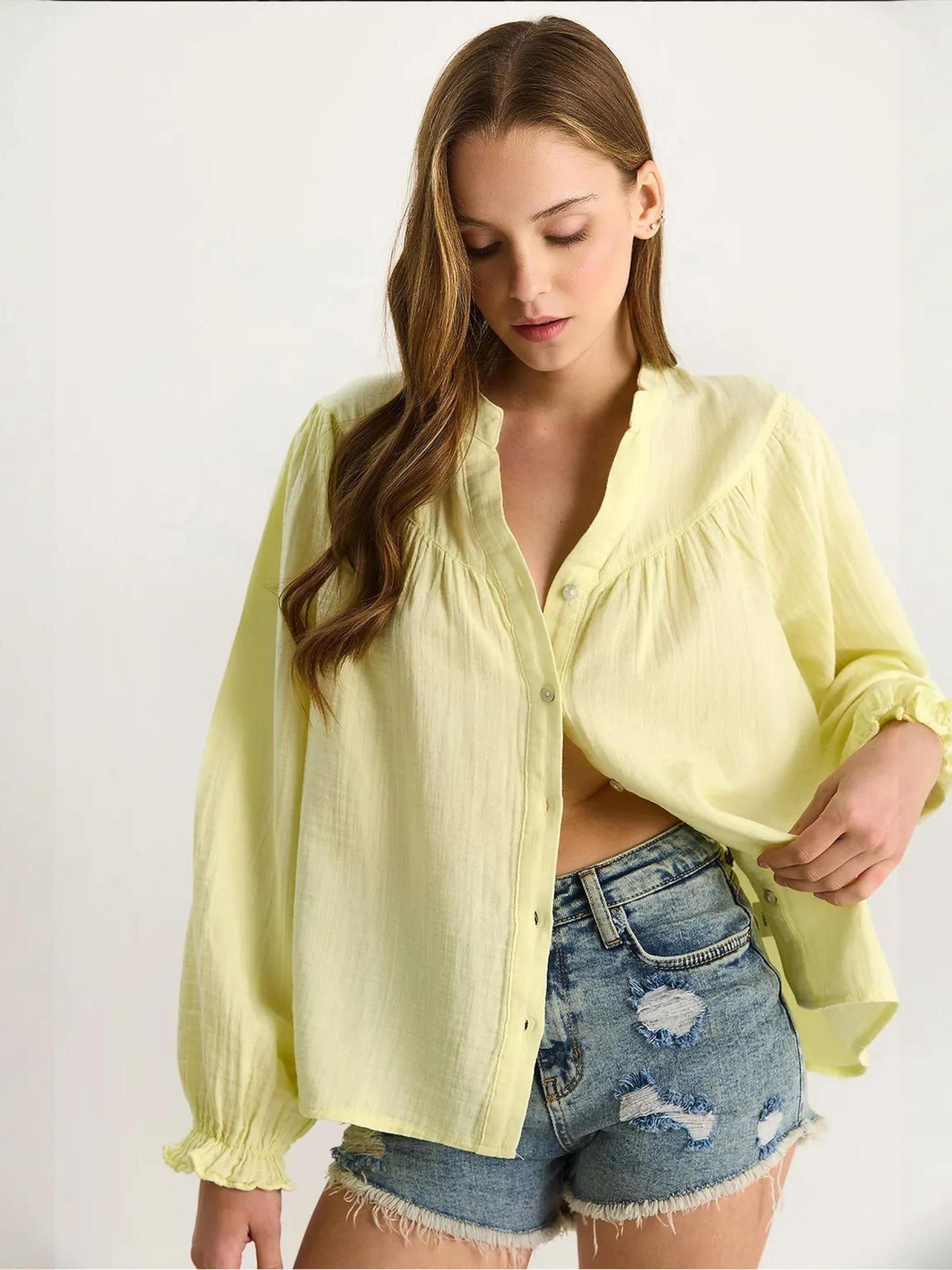 Bianco Lucci Блузка лимонно-желтого цвета
Bianco Lucci Блузка лимонно-желтого цвета