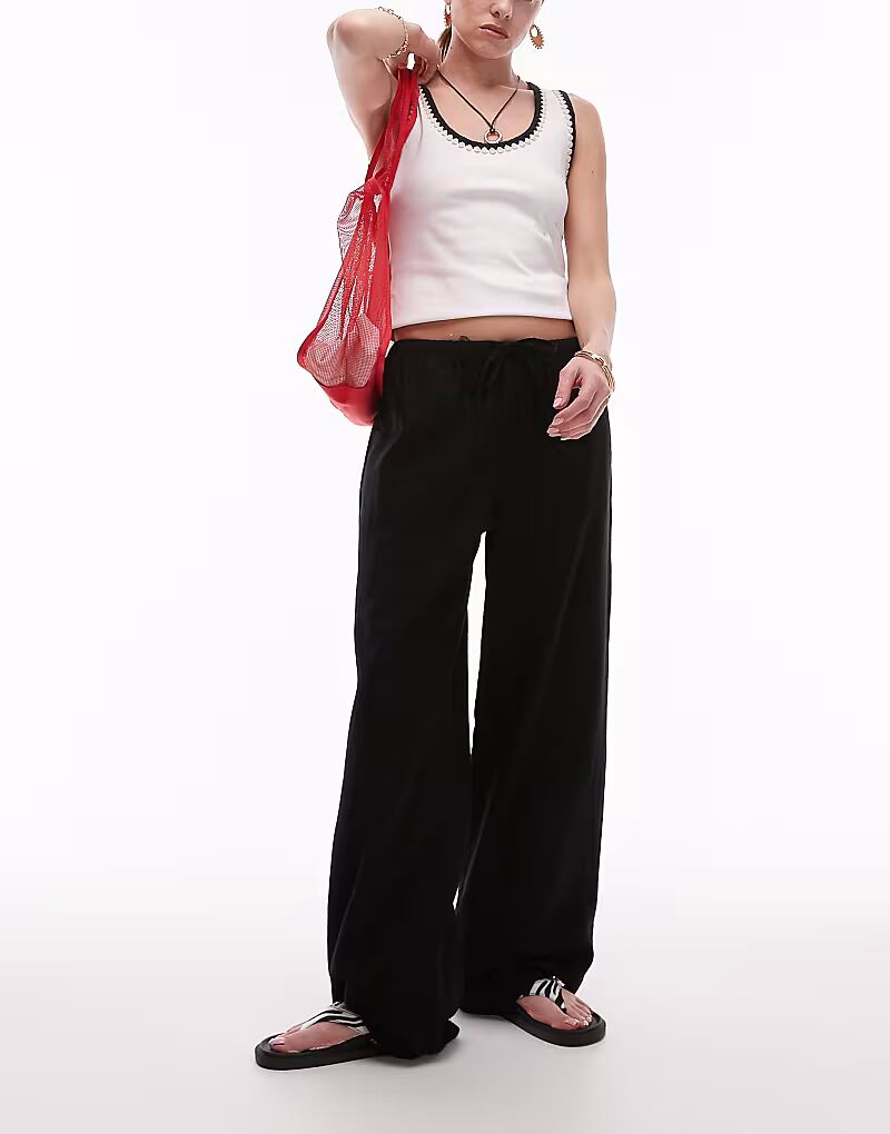 Прямые льняные брюки Topshop черного цвета
Прямые льняные брюки Topshop черного цвета