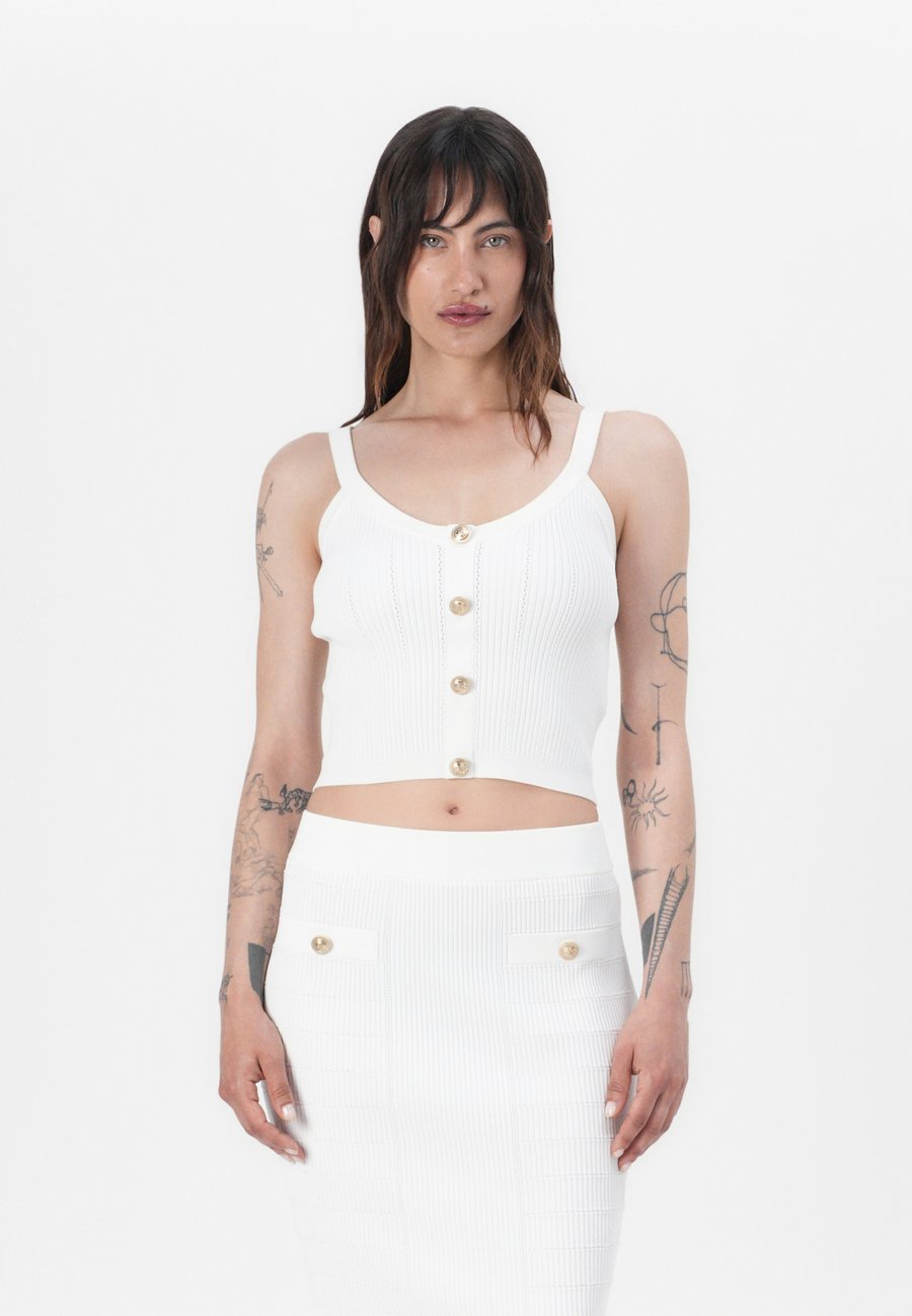 Топ Guess EMMIE TANK, Cream White/Off-White
Топ Guess EMMIE TANK, Cream White/Off-White
