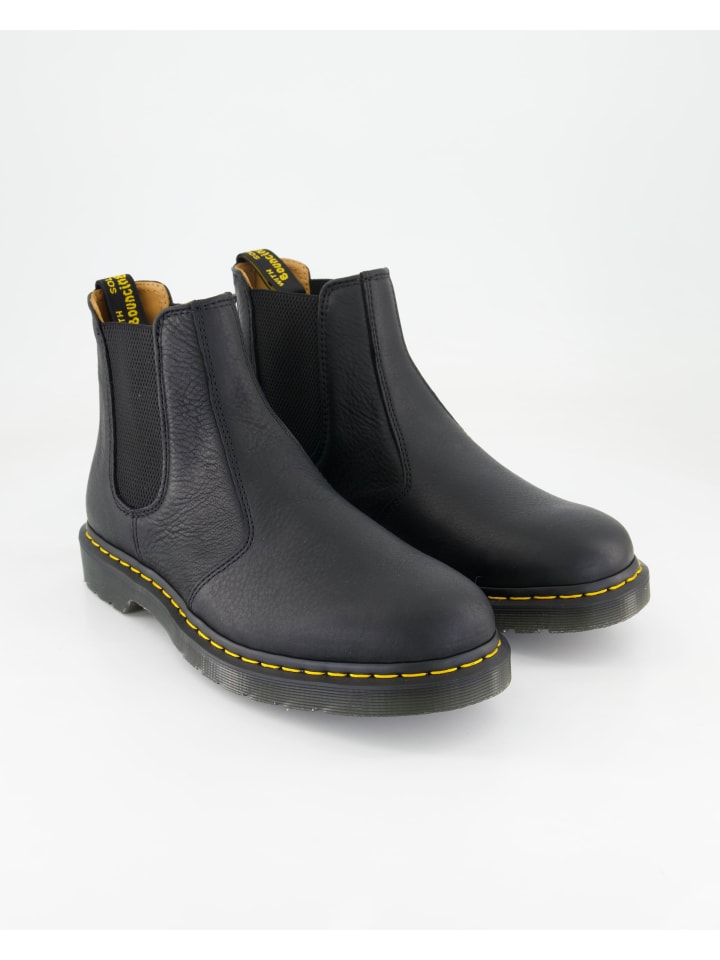 Черные ботильоны Dr. Martens
Черные ботильоны Dr. Martens