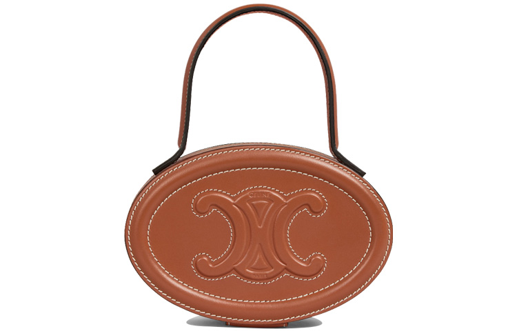 CELINE Круглая косметичка из коровьей кожи 
CELINE Круглая косметичка из коровьей кожи