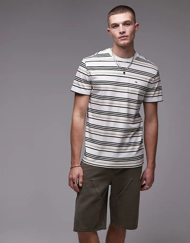 Футболка в полоску с логотипом Tommy Jeans белого цвета
Футболка в полоску с логотипом Tommy Jeans белого цвета