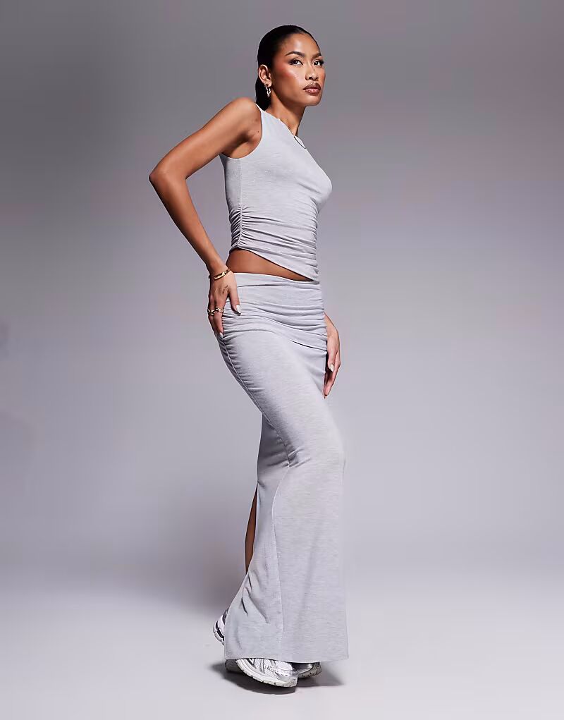 Топ без рукавов из премиального джерси со сборками, серый меланж Wanderdoll
Топ без рукавов из премиального джерси со сборками, серый меланж Wanderdoll