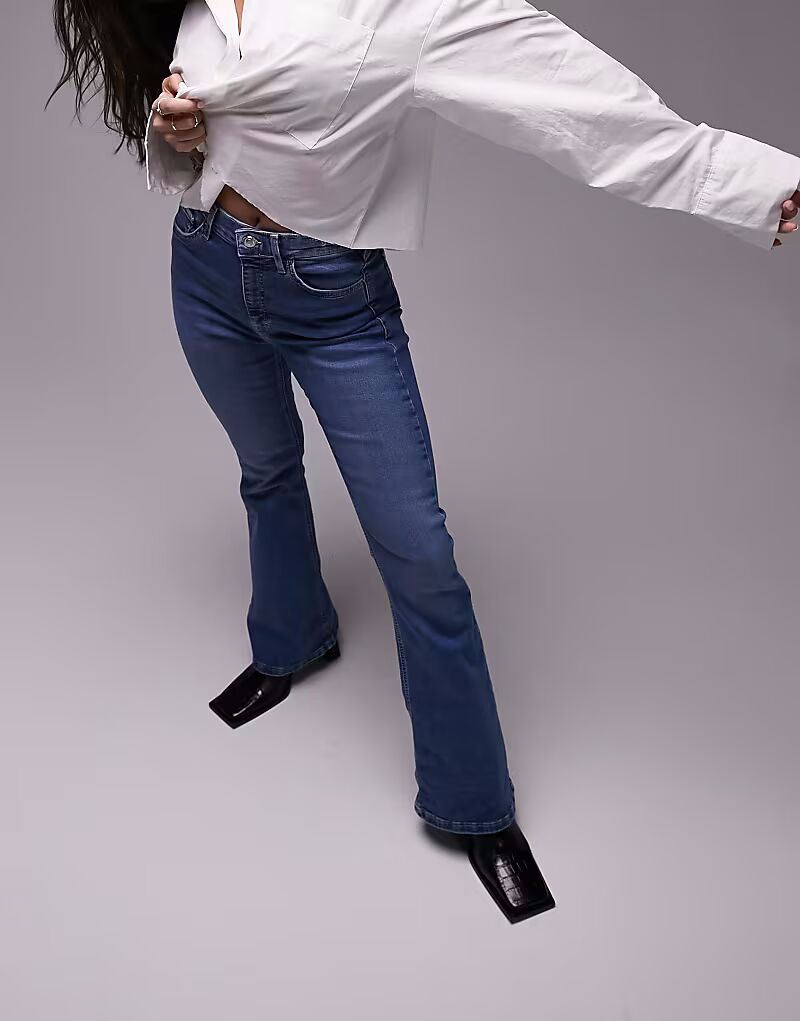 Джинсы Hourglass Jamie Flare с высокой посадкой, средне-синего цвета Topshop Hourglass
Джинсы Hourglass Jamie Flare с высокой посадкой, средне-синего цвета Topshop Hourglass