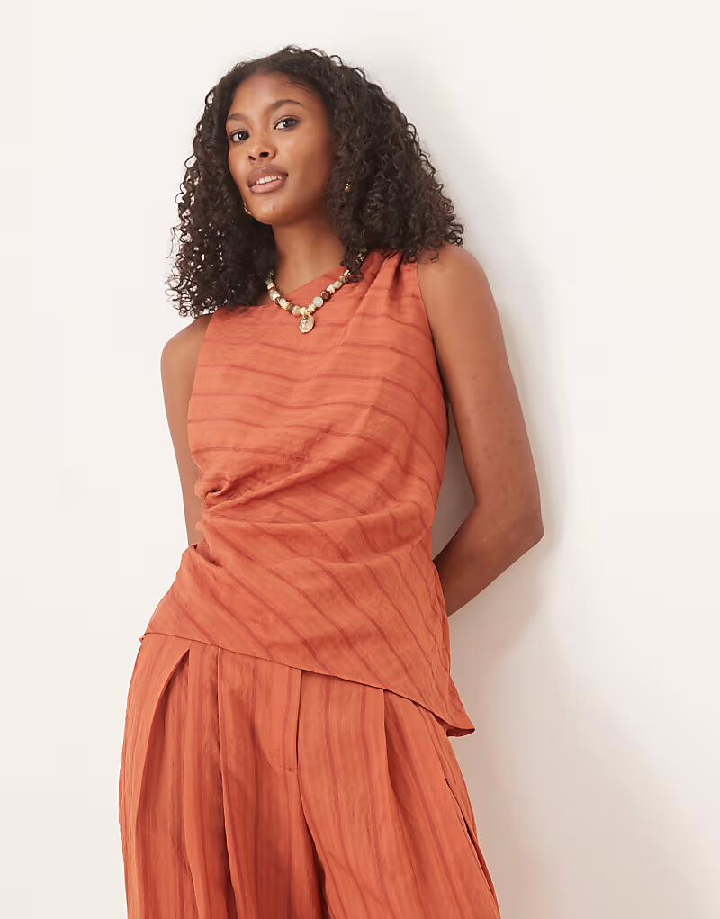 Топ с асимметричной текстурированной полоской и перекрученной отделкой Asos Design, оранжево-коричневый
Топ с асимметричной текстурированной полоской и перекрученной отделкой Asos Design, оранжево-коричневый