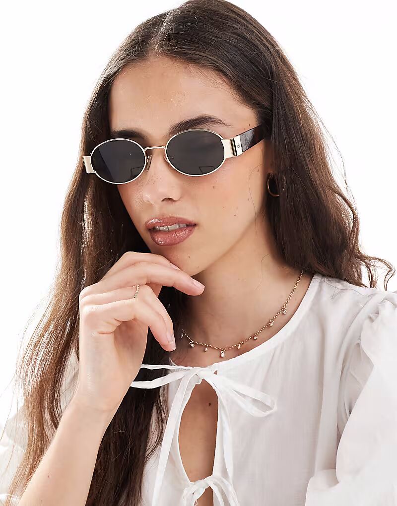 Солнцезащитные очки Aire Mars II в тонкой овальной металлической оправе с черепаховым узором 
Солнцезащитные очки Aire Mars II в тонкой овальной металлической оправе с черепаховым узором