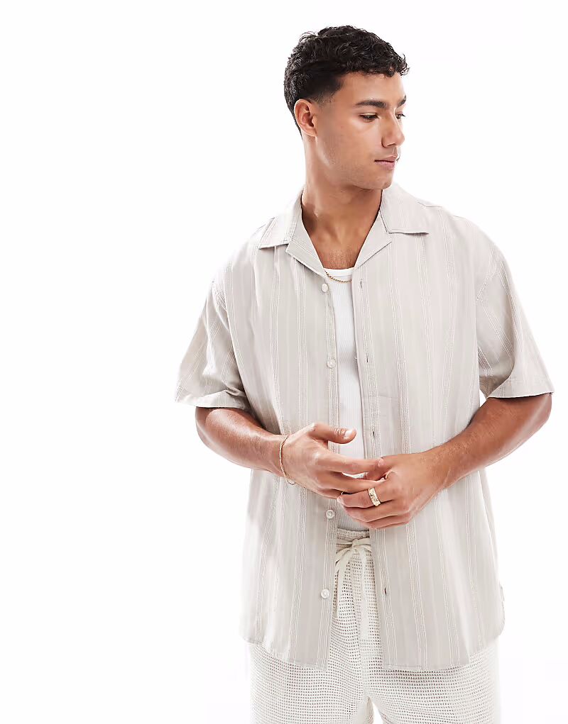 Рубашка из смеси льна и вышивки Jack & Jones в цвете «stone»
Рубашка из смеси льна и вышивки Jack & Jones в цвете «stone»