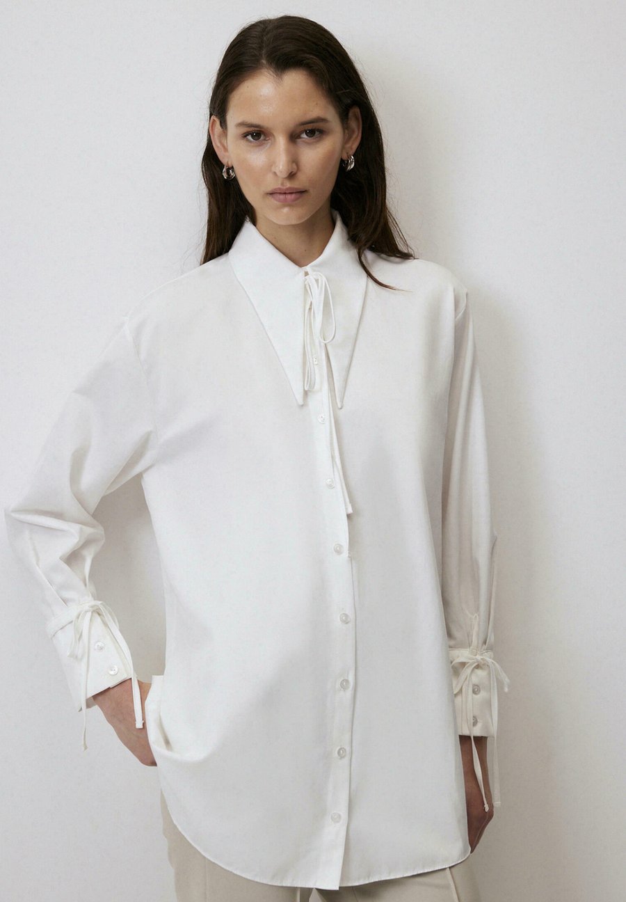 Блуза Touché Privé TIE DETAIL, White/White
Блуза Touché Privé TIE DETAIL, White/White