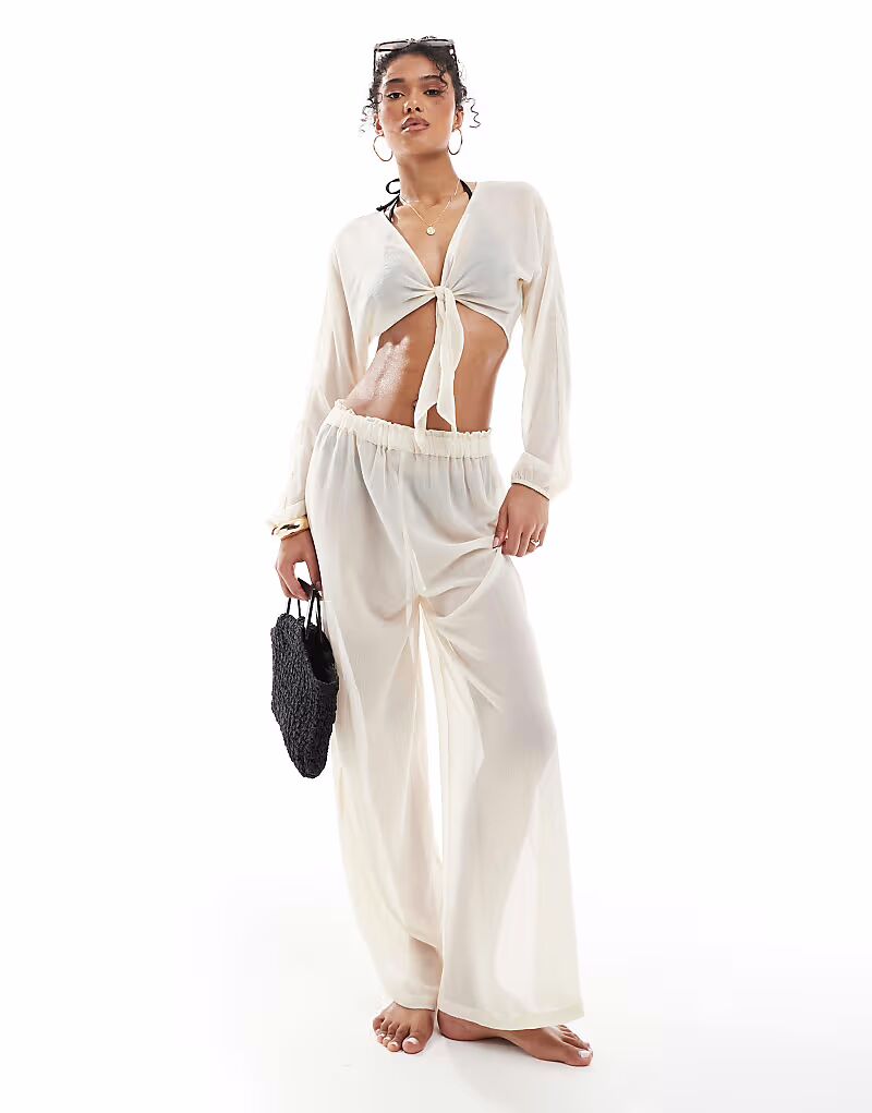 ONLY пляжный комплект из завязок спереди и брюк кремового цвета
ONLY пляжный комплект из завязок спереди и брюк кремового цвета