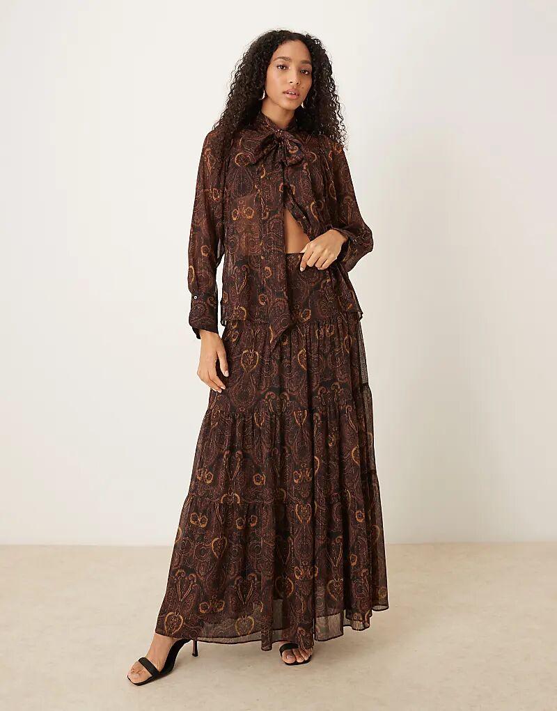 Юбка макси Mango с многоярусным принтом пейсли
Юбка макси Mango с многоярусным принтом пейсли