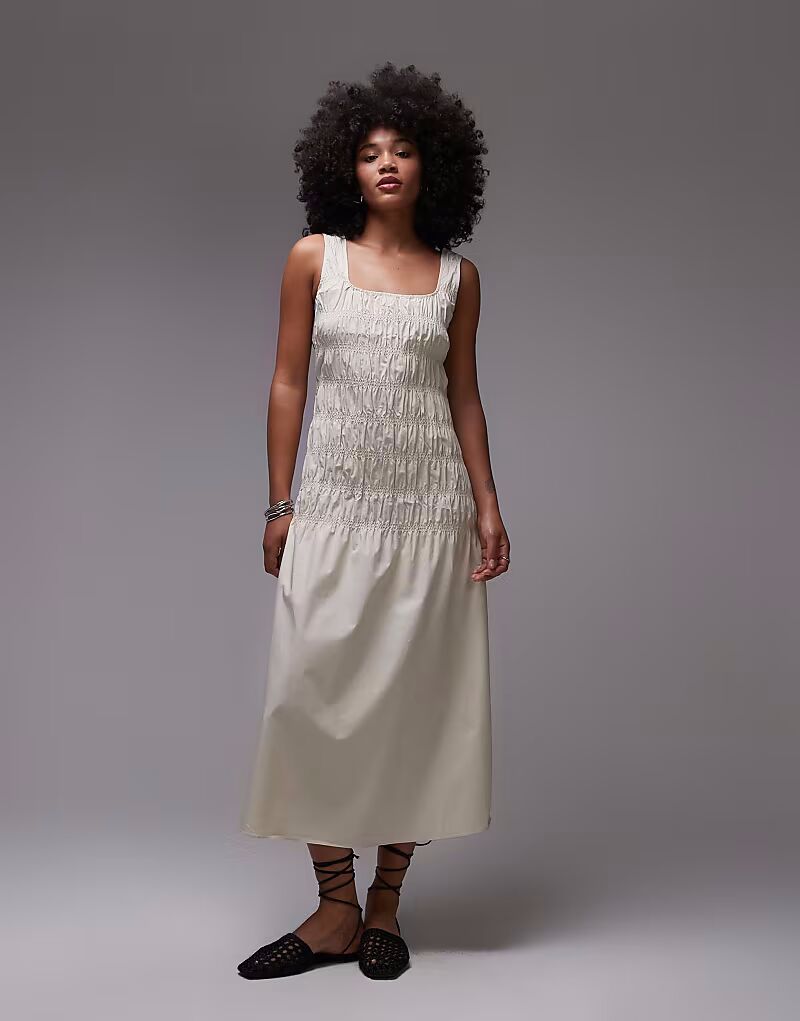 Платье миди ARKET из хлопка с присборенным лифом и заниженной талией бежевого цвета
Платье миди ARKET из хлопка с присборенным лифом и заниженной талией бежевого цвета