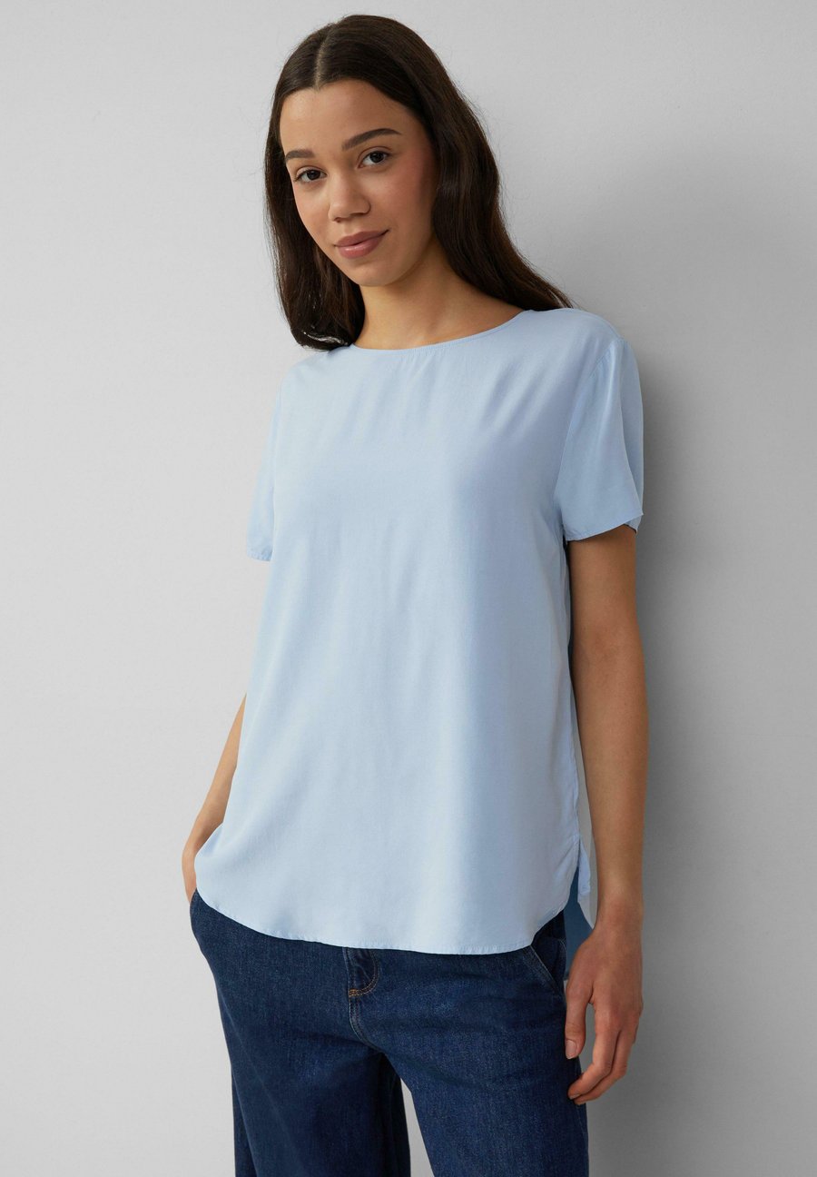 Блуза QS KURZARM, Hellblau/Light Blue
Блуза QS KURZARM, Hellblau/Light Blue