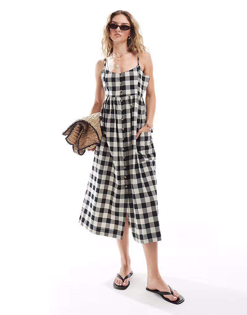 Платье миди Brave Soul на пуговицах с бретельками и принтом в черную клетку
Платье миди Brave Soul на пуговицах с бретельками и принтом в черную клетку