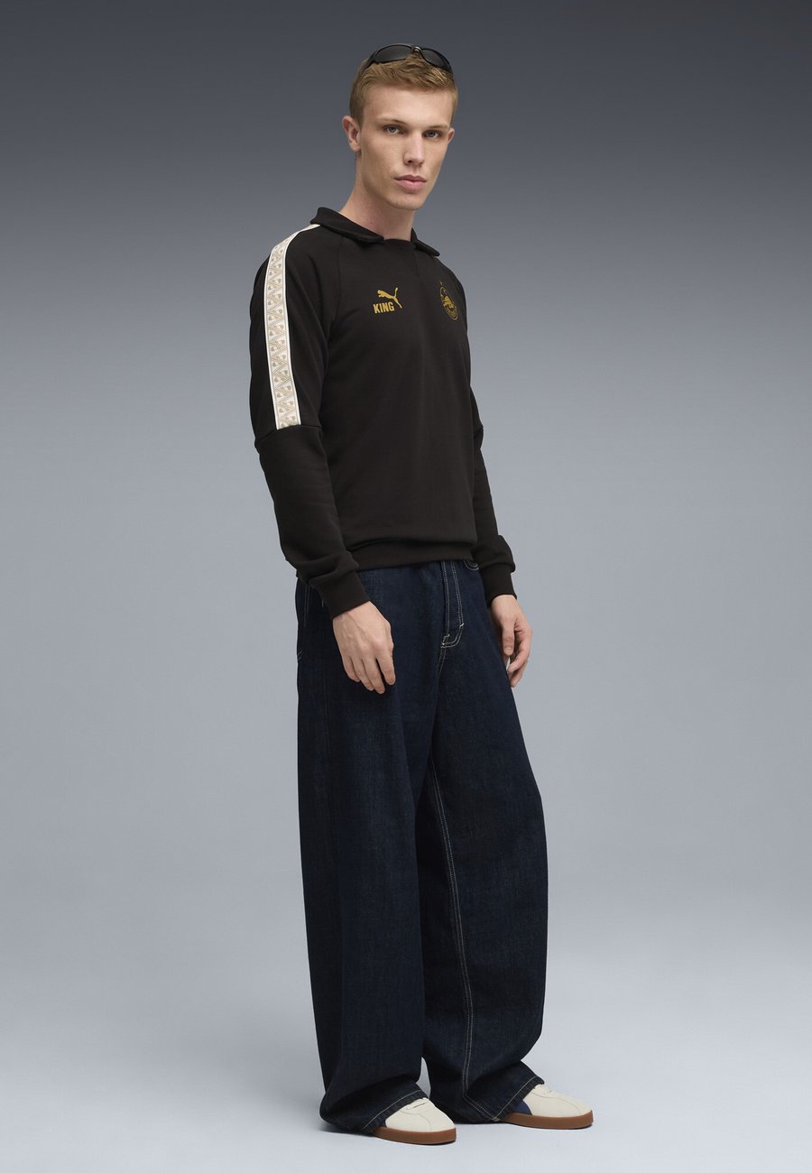 Толстовка Puma Sweatshirt, Black-Matte Gold/Black
Толстовка Puma Sweatshirt, Black-Matte Gold/Black
