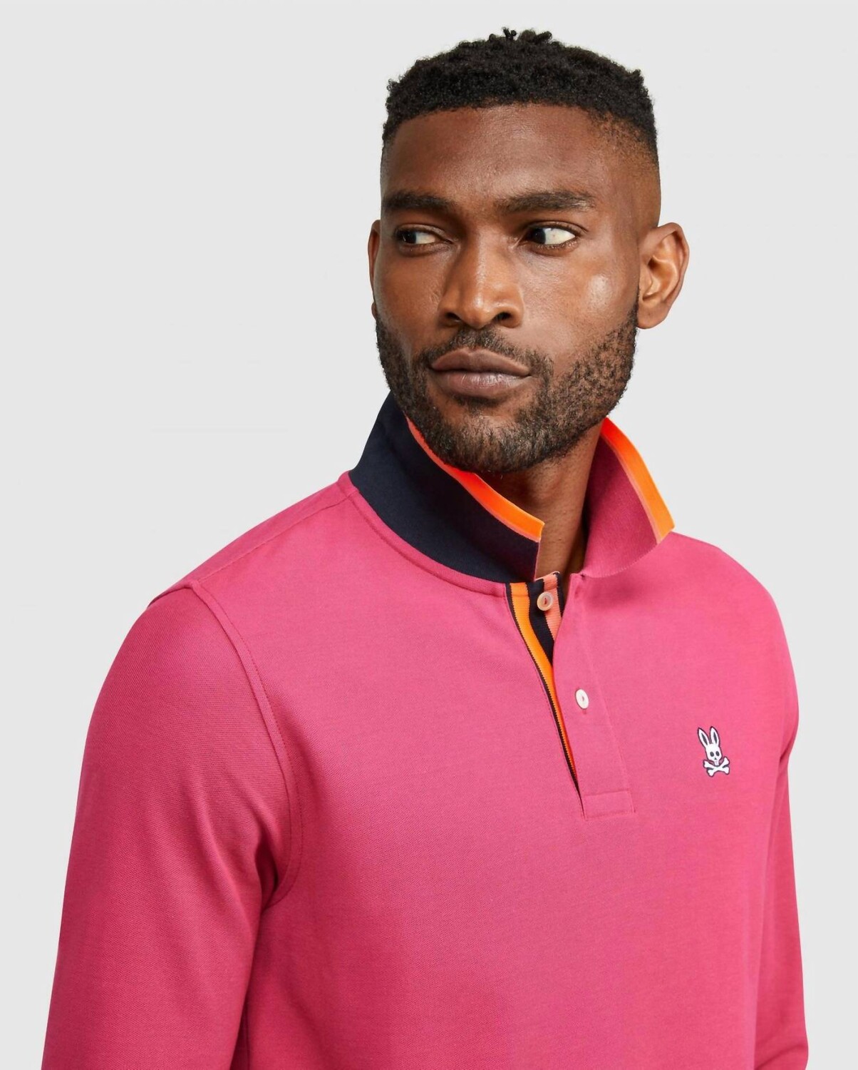 Клюквенная футболка-поло с длинными рукавами и кончиками Psycho Bunny
Клюквенная футболка-поло с длинными рукавами и кончиками Psycho Bunny