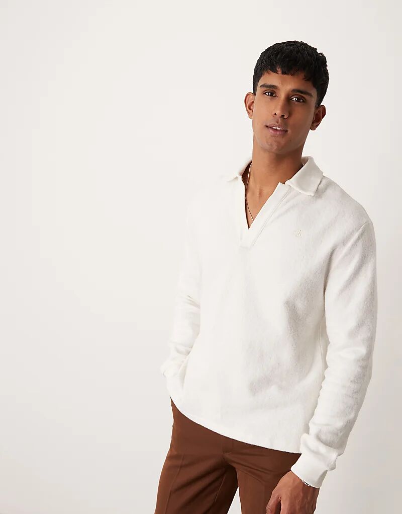 Уютный топ-поло с длинными рукавами в оттенке белого — эксклюзивно для ASOS Calvin Klein Jeans
Уютный топ-поло с длинными рукавами в оттенке белого — эксклюзивно для ASOS Calvin Klein Jeans