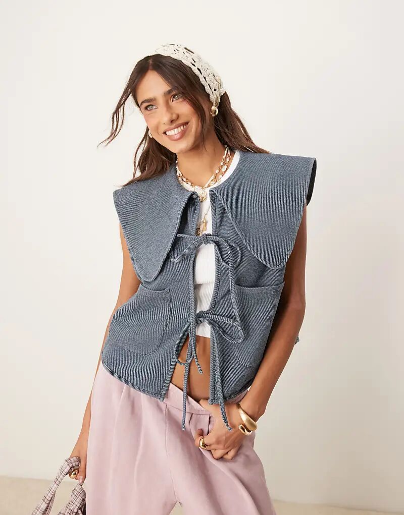 Жилет ASOS DESIGN в джинсовом стиле с воротником Питер Пэн и завязкой спереди
Жилет ASOS DESIGN в джинсовом стиле с воротником Питер Пэн и завязкой спереди