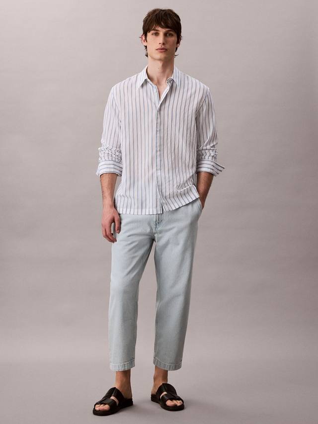 Джинсы High Rise с зауженным силуэтом Calvin Klein, Charlie Indigo
Джинсы High Rise с зауженным силуэтом Calvin Klein, Charlie Indigo