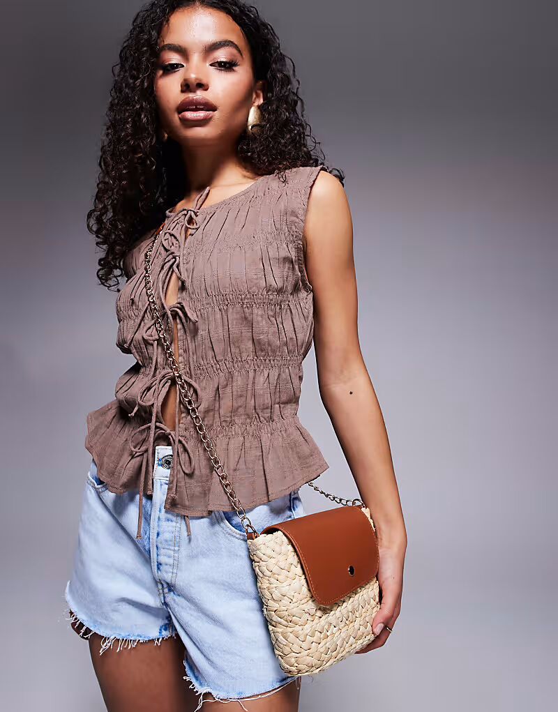 Соломенная сумка через плечо South Beach с контрастным клапаном коричневого цвета
Соломенная сумка через плечо South Beach с контрастным клапаном коричневого цвета