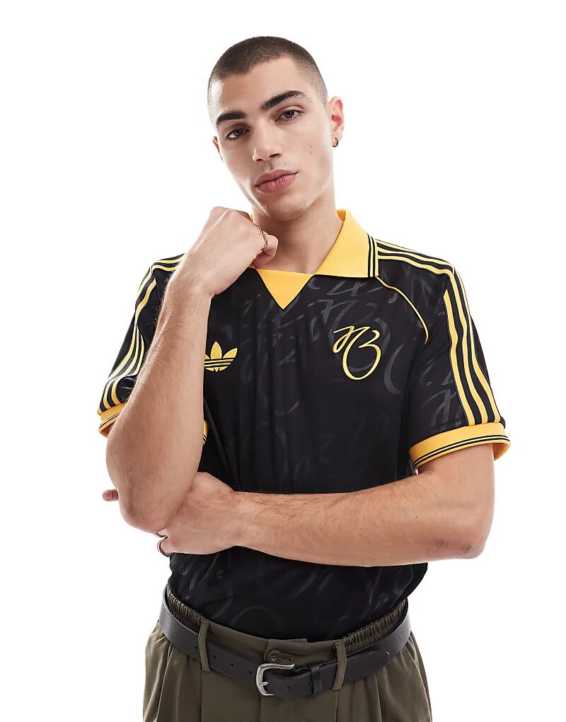 Футболка Джуда Беллингхэма черного цвета adidas Originals
Футболка Джуда Беллингхэма черного цвета adidas Originals