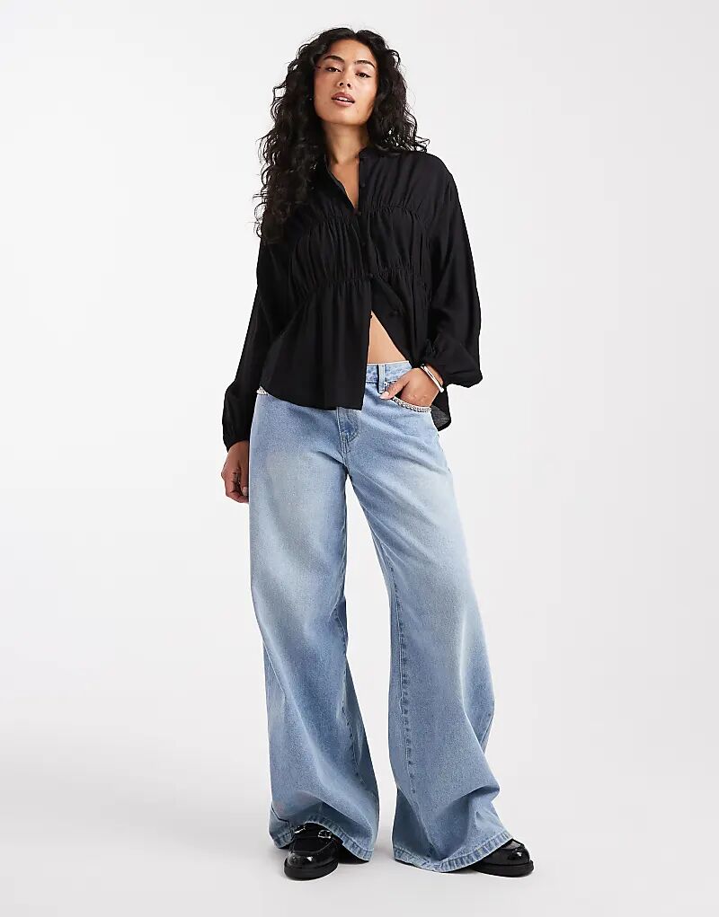 Потертая блузка с длинными рукавами на пуговицах, черного цвета
Потертая блузка с длинными рукавами на пуговицах, черного цвета