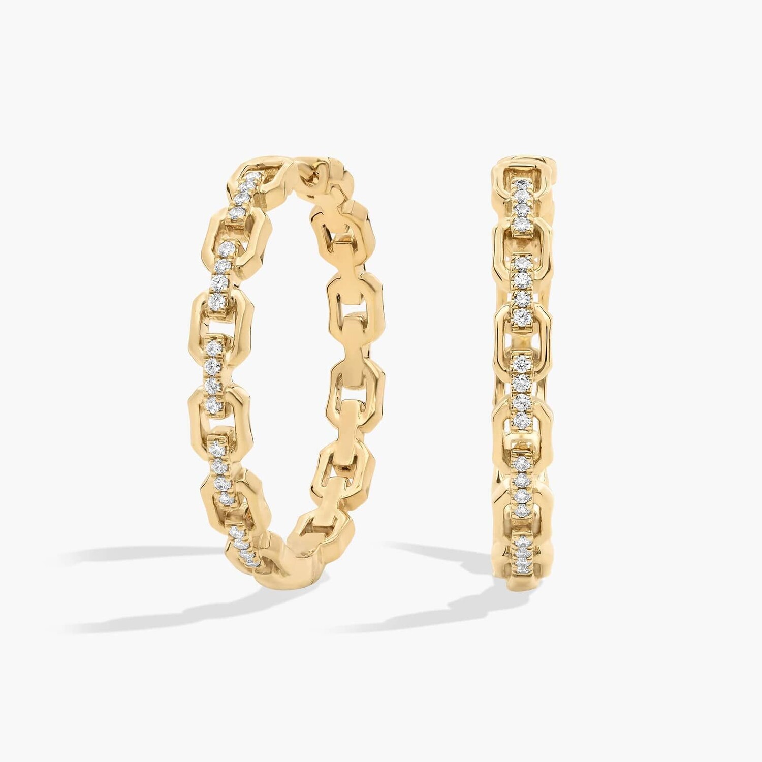 Серьги-кольца с бриллиантами в форме геометрических звеньев из желтого золота 14 карат Blue Nile
Серьги-кольца с бриллиантами в форме геометрических звеньев из желтого золота 14 карат Blue Nile