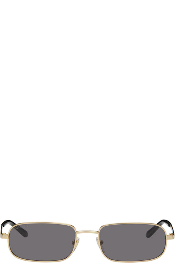 Золотые прямоугольные солнцезащитные очки Gucci
Золотые прямоугольные солнцезащитные очки Gucci