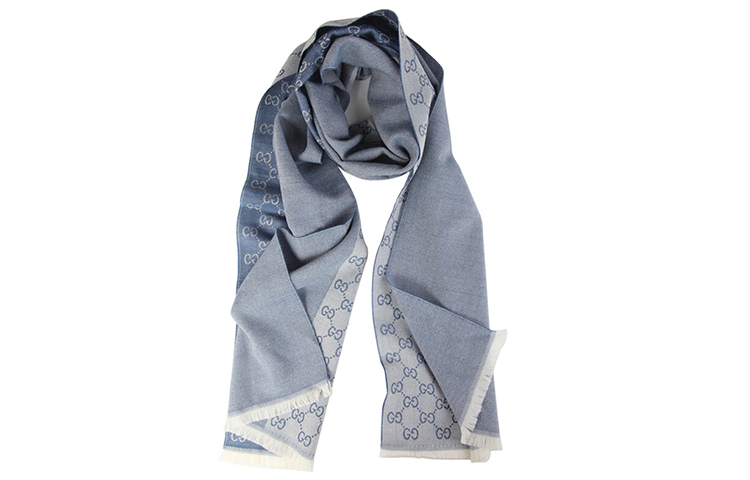 Шерстяной и шелковый вязаный шарф GUCCI
Шерстяной и шелковый вязаный шарф GUCCI