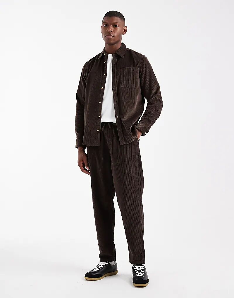 Брюки-комбинезон New Look темно-коричневого цвета
Брюки-комбинезон New Look темно-коричневого цвета