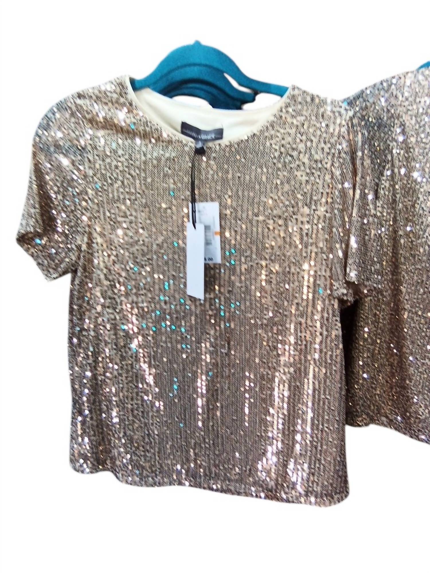 Женская диско-блузка в золотом цвете Pine Apparel
Женская диско-блузка в золотом цвете Pine Apparel